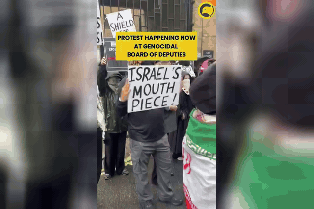 Protesters outside the Board of Deputies of British Jews headquarters in London, as Jewish communities marked three years since Hamas terrorists murdered around 1,200 people and took more than 250 hostages.