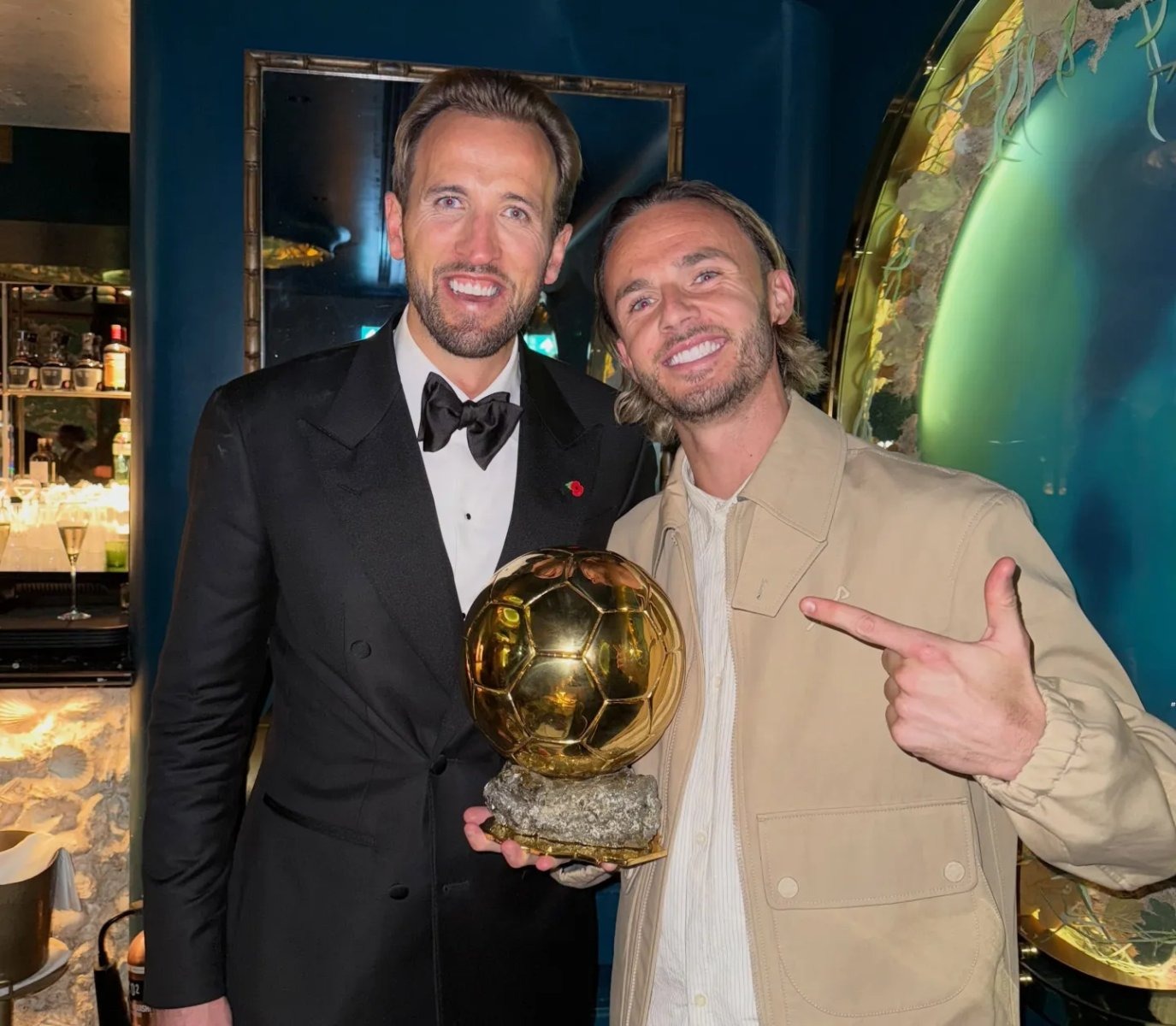 Harry Kane celebrates winning the Ballon d'Or, an award announced by Brazilian legend Ronaldo at a ceremony at the London Palladium on Monday night.