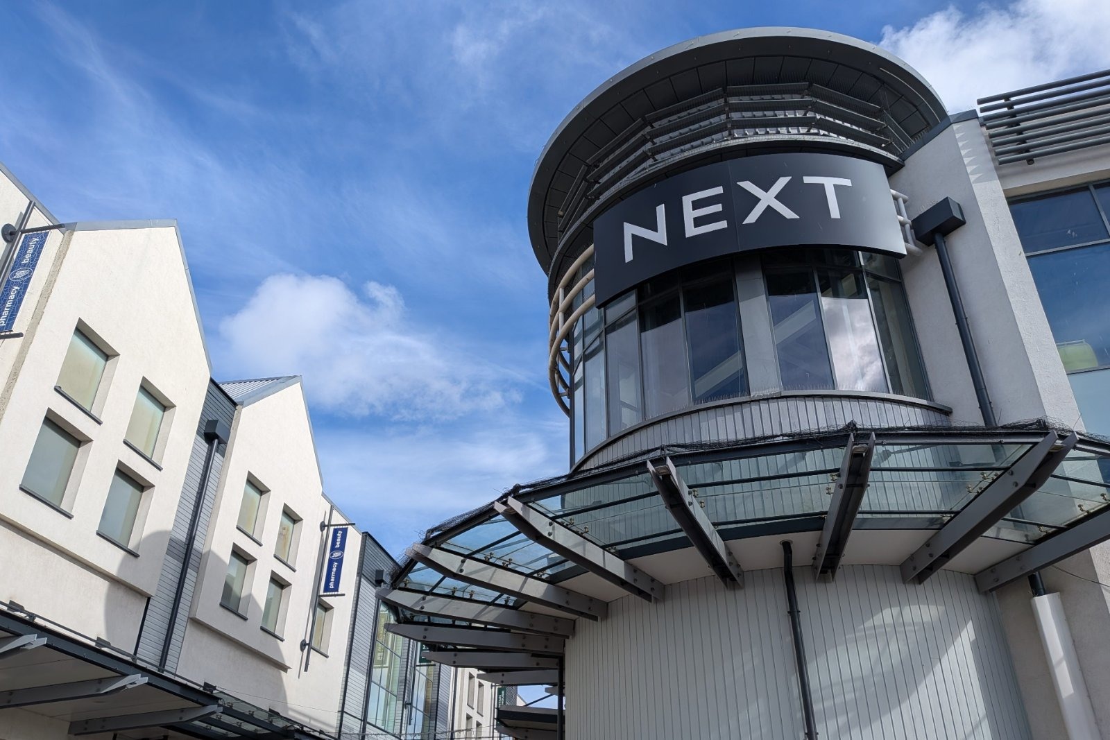 Next raised its full-year pre-tax profit forecast for a fourth time this year, to £1.26bn, after a 24% surge in international sales helped group sales jump 9%.