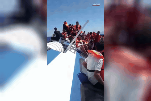 Survivors in lifejackets were seen sitting atop the upturned orange hull as nearby boats joined the coastguard response four miles off the Kyrenia coast.