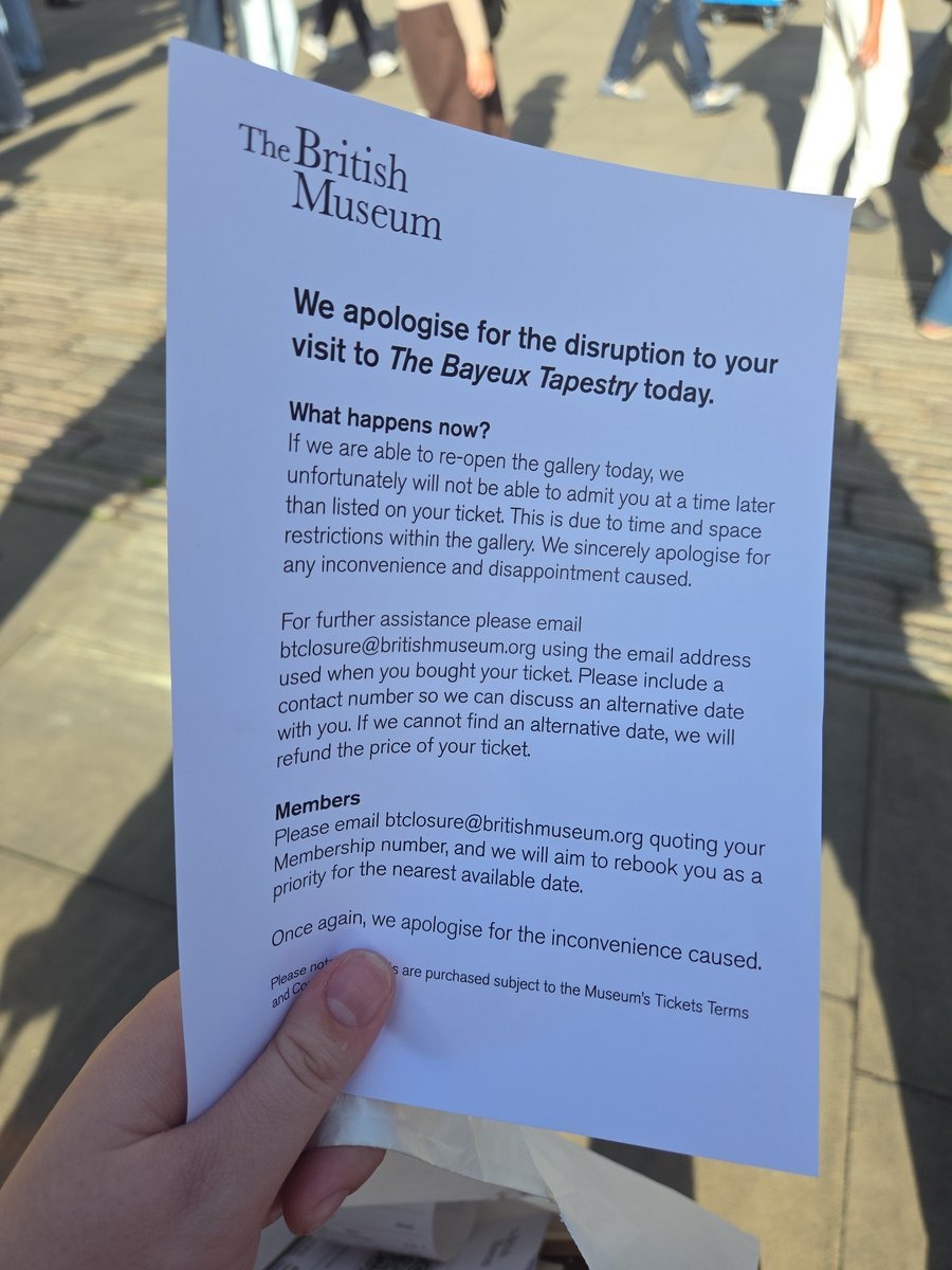 The apology notice handed to turned-away visitors, some of whom had queued for hours to see what is thought to be the tapestry's first visit to British soil in nearly 1,000 years.