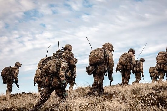 British soldiers on moorland terrain in the Falkland Islands during Exercise Cape Upholder, a six-day drill replicating the 1982 amphibious landings — the first such war-game in years.