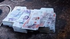 A police handout image from Operation Warrior, which uncovered links to criminal networks in the Middle East and Asia and saw 33 suspects remanded in custody alongside gold bars and seven Rolex watches.