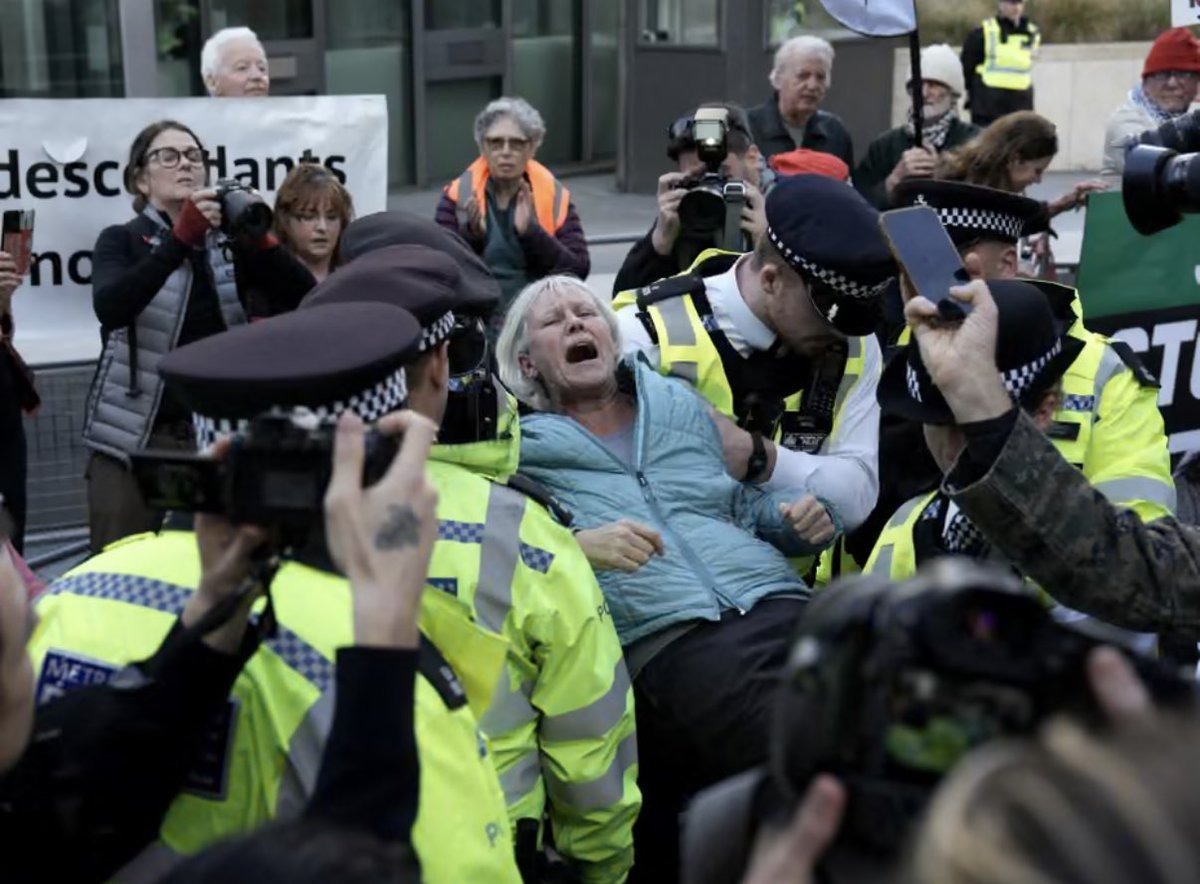 Palestine Action supporters detained by Metropolitan Police officers outside the US Embassy in London, days before a Supreme Court hearing on 4 November that will challenge the group's proscription as a terrorist organisation.