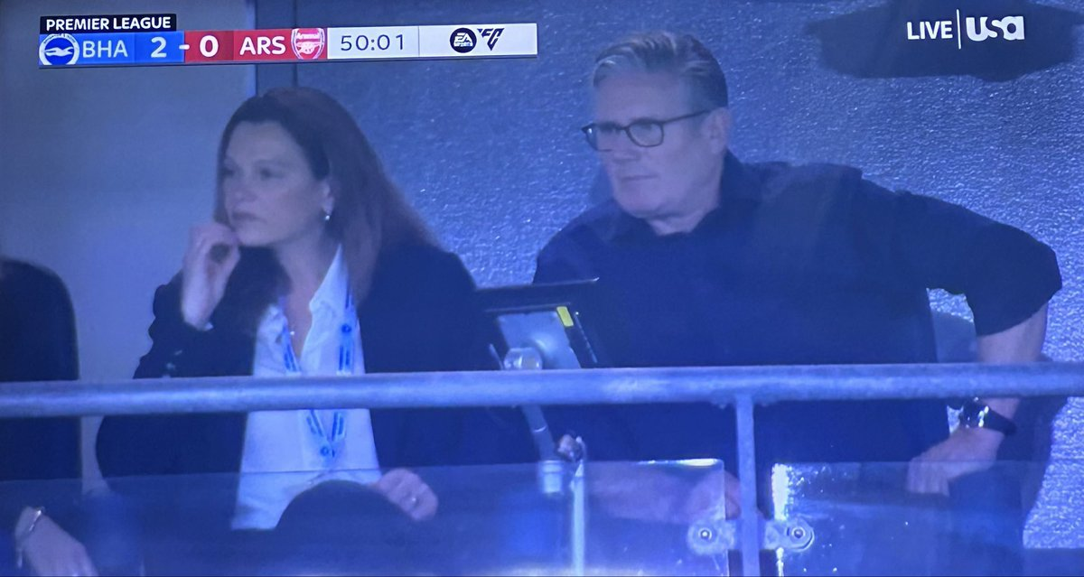 Keir Starmer and Victoria Starmer at a Premier League match. Victoria has also modelled in designer Edeline Lee's spring/summer 2027 show, whose clothes are a favourite of the Princess of Wales.
