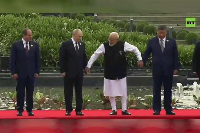 Narendra Modi, Indian Prime Minister, and Vladimir Putin, Russian President as Washington's tariff bill now awaits Trump's signature before becoming law.