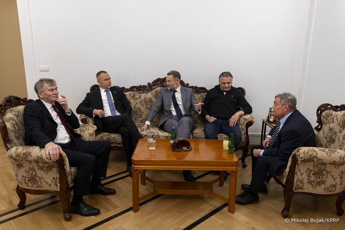 President Karol Nawrocki (second left) inside the Constitutional Tribunal with Zbigniew Kapiński, First President of the Supreme Court (far left), Zbigniew Bogucki, head of the President's Office (centre), Sławomir Cenckiewicz, head of the National Security Bureau (second right), and Bartłomiej Sochański, the tribunal's vice-president (far right), one of the two officials suspended and facing the loss of immunity.