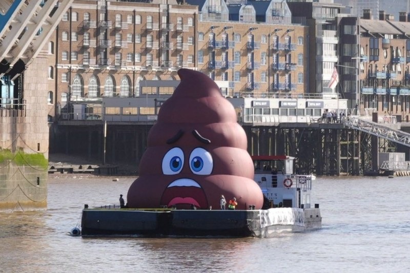 The River Thames, carrying the giant inflatable poo sculpture Danny Dyer floated to press his water nationalisation campaign.