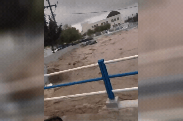 Floodwaters on the Greek holiday island of Rhodes, where a 62-year-old hotel worker died after surging torrents swept his car onto a beach near the coastal village of Stegna.