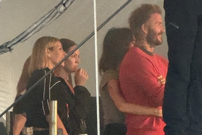 David and Victoria Beckham watched from the wings as Cruz Beckham performed his Reading Festival debut, with Victoria seen with her arms around David throughout the rain-soaked set.