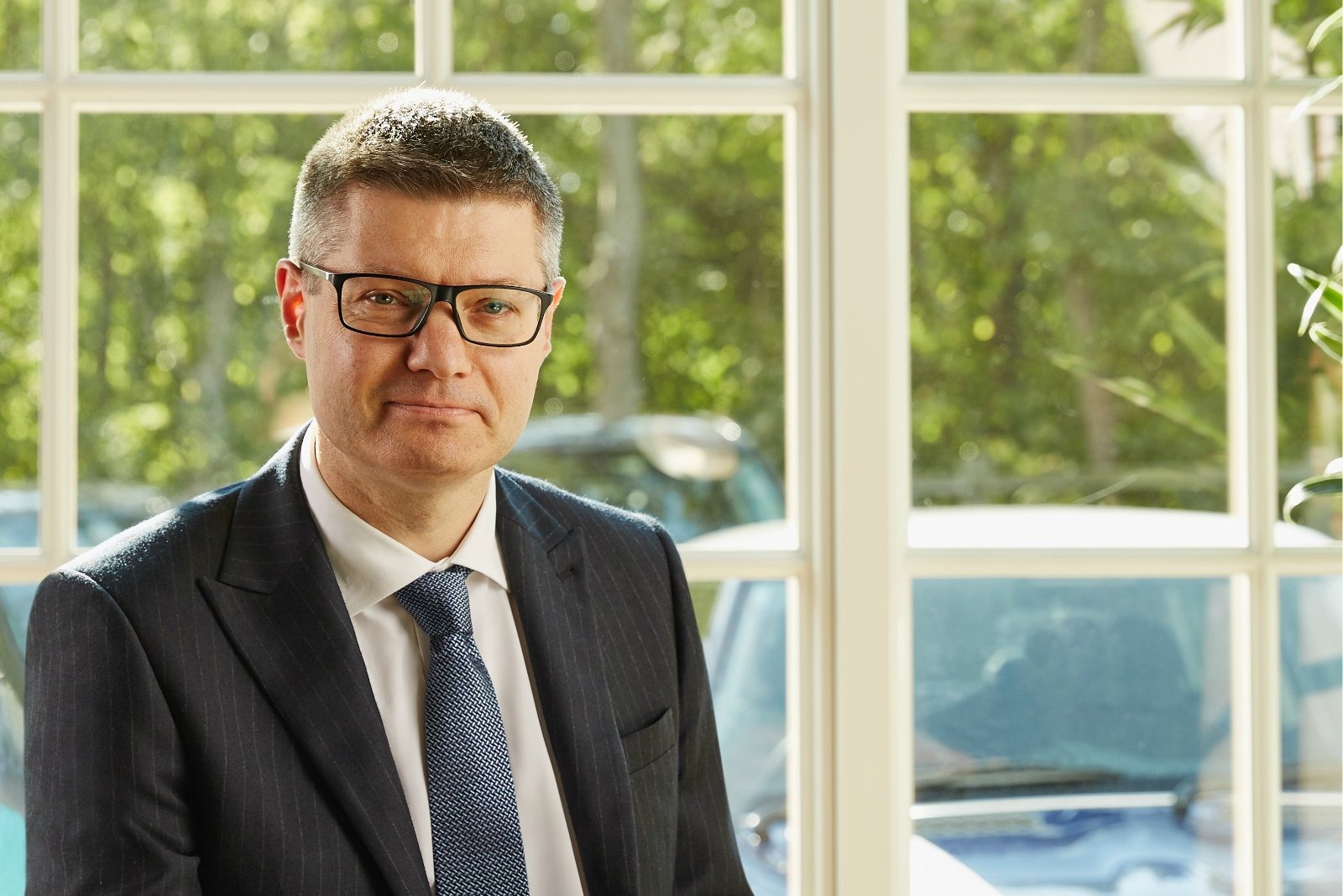 Lord Simon Wolfson, chief executive of Next, whose company has cut its UK sales growth outlook for the second half of the year even as it raised its full-year profit forecast to £1.26bn.