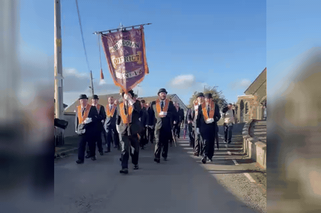 Orangemen on Drumcree Road, where police halted a second Orange Order parade attempt at 4am on Monday, pushing Northern Ireland's power-sharing executive to the brink.