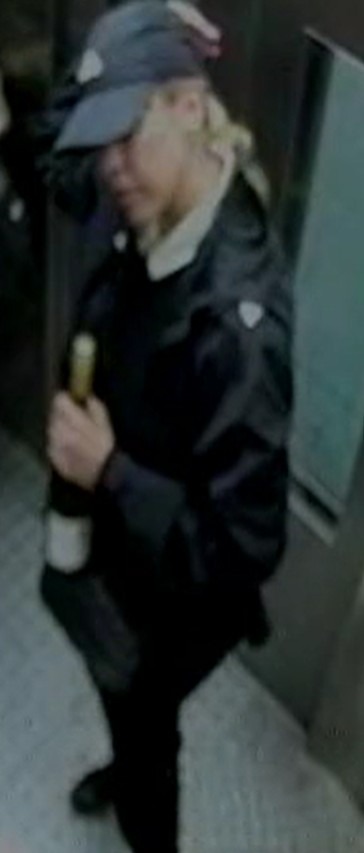 A CCTV image of the blonde woman in a dark hat and dark clothes with a white collar who British Transport Police want to identify after she allegedly tried to take a seven-year-old girl's hand at West Ham Underground…