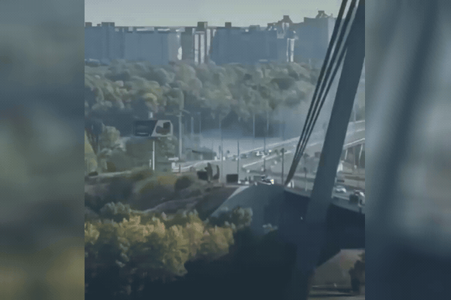 A Russian drone targets a busy commercial bridge in central Kyiv, where ballistic missiles and drones killed at least two people overnight in what the Kremlin described as a 'massive' strike timed to Vladimir Putin's…