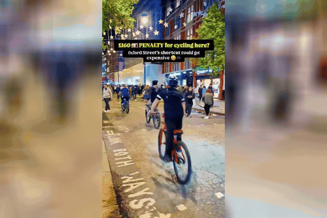 A cyclist rides along Oxford Street despite the pedestrianisation ban, which carries a £160 fine for those caught cycling in the zone.