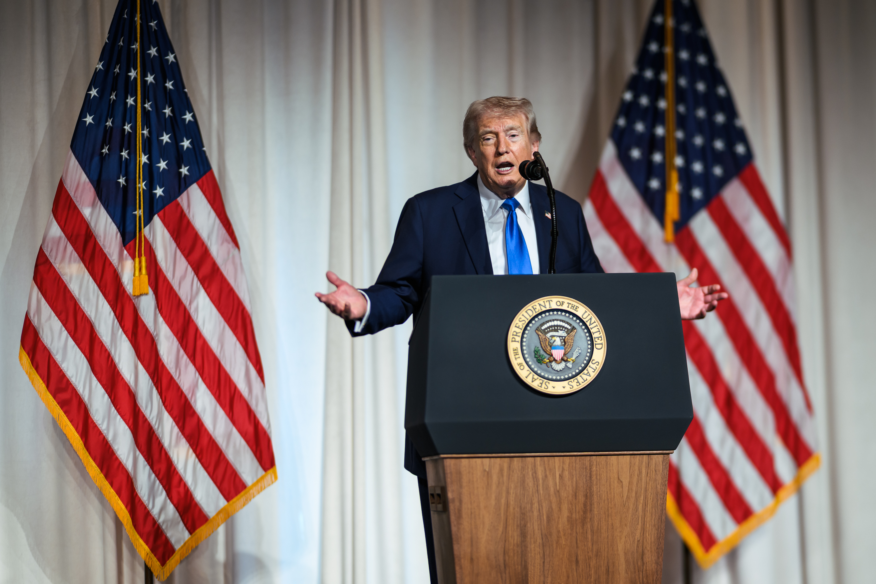 Trump sends judge 'Trash Island' pictures to study while she weighs halting work on his Washington golf course