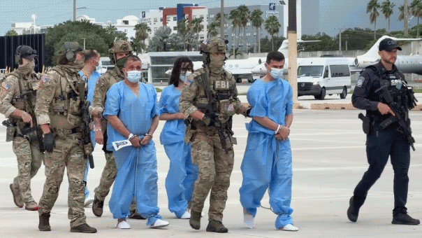 Eighteen defendants — including a former Haiti Ministry of Justice anti-corruption official — are brought before a Miami federal court, accused of funding the July 2021 assassination of President Jovenel Moïse through…