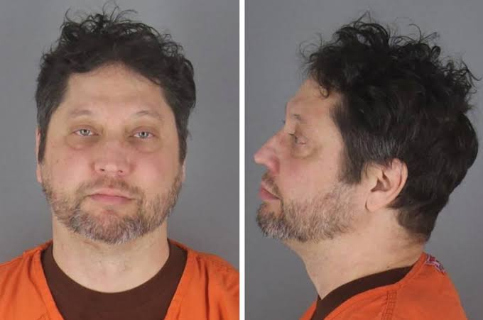 Anthony Kazmierczak, in a police custody photograph, had researched Omar's security detail and arranged dog care and bail contacts before attending the Minneapolis town hall.