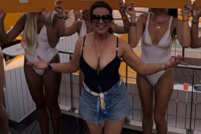 Susanna Reid posed with "Vote GMB" placards at O Beach Ibiza, celebrating the show's first National TV Awards daytime shortlisting in years.