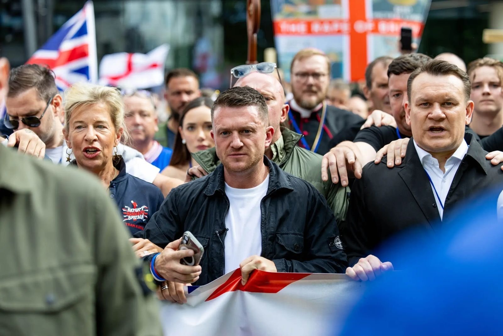 Tommy Robinson, who denies two counts of harassment causing fear of violence, allegedly told journalists he had "located every f****** one of you" and to "expect me to come knocking.