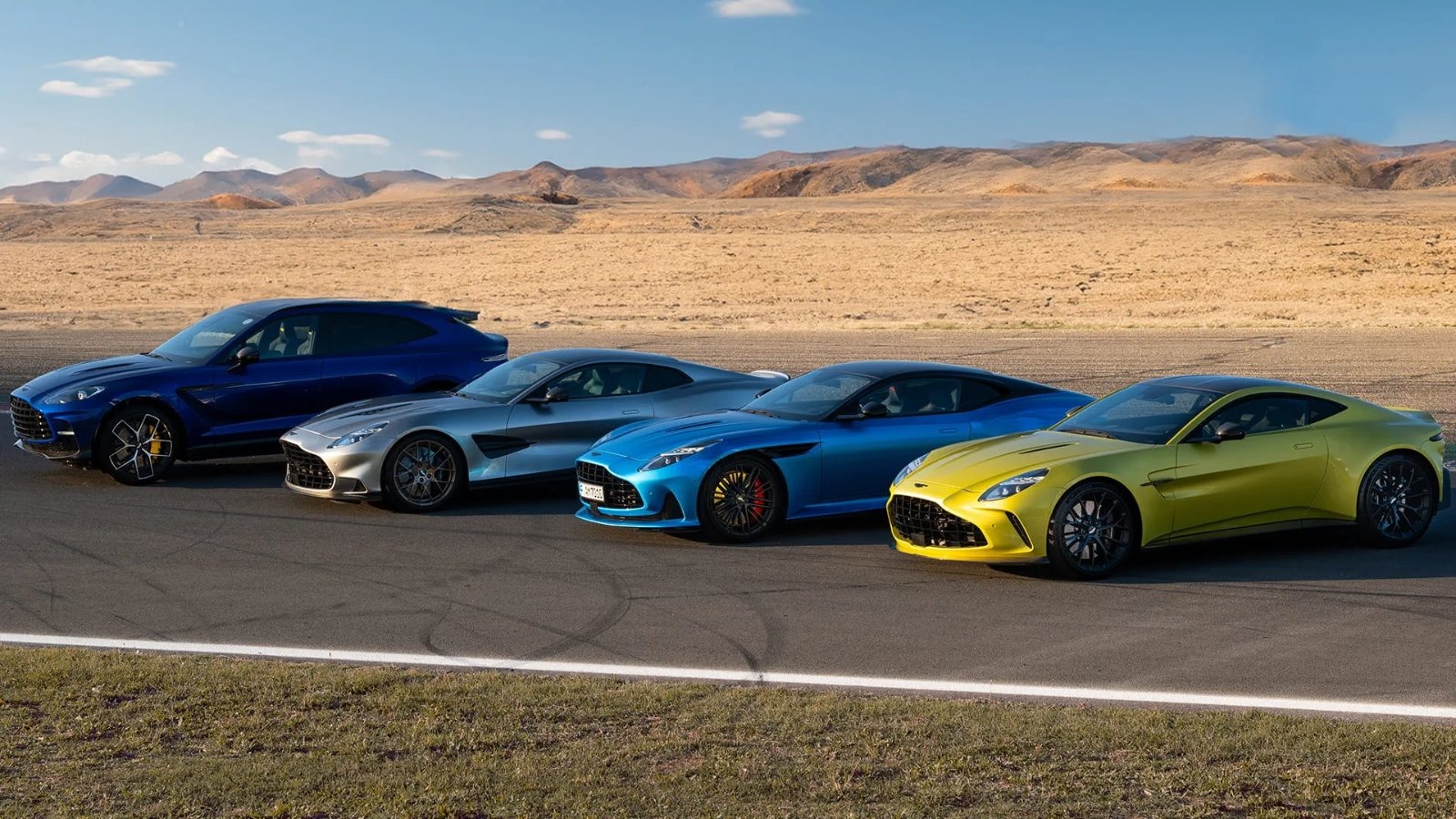 Aston Martin cars like those whose deliveries drove a 36% revenue surge to £388.7m in the British luxury carmaker's third quarter, narrowing its overall losses.