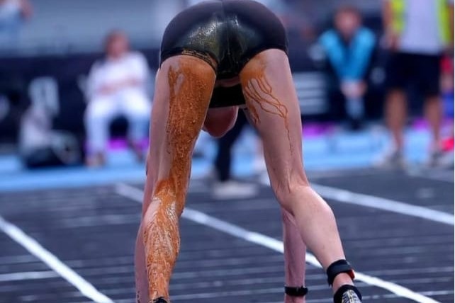 Joanna Wietrzyk, whose images completing the race in this condition spread widely online, has since apologised and forfeited her Beijing win, saying she should have stepped off the track.