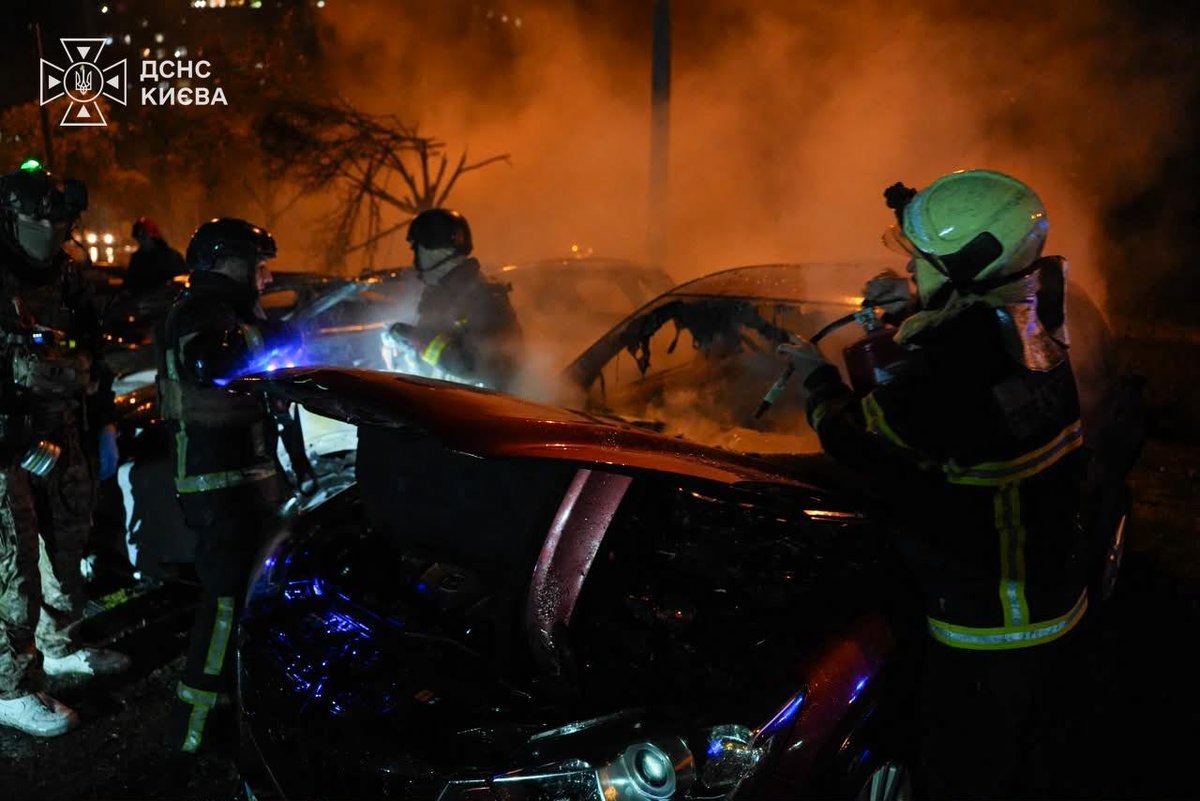 Burning cars in Kyiv after a Russian missile and drone strike. Russia launched 161 drones and hit 18 locations across Ukraine overnight, killing at least eight civilians.