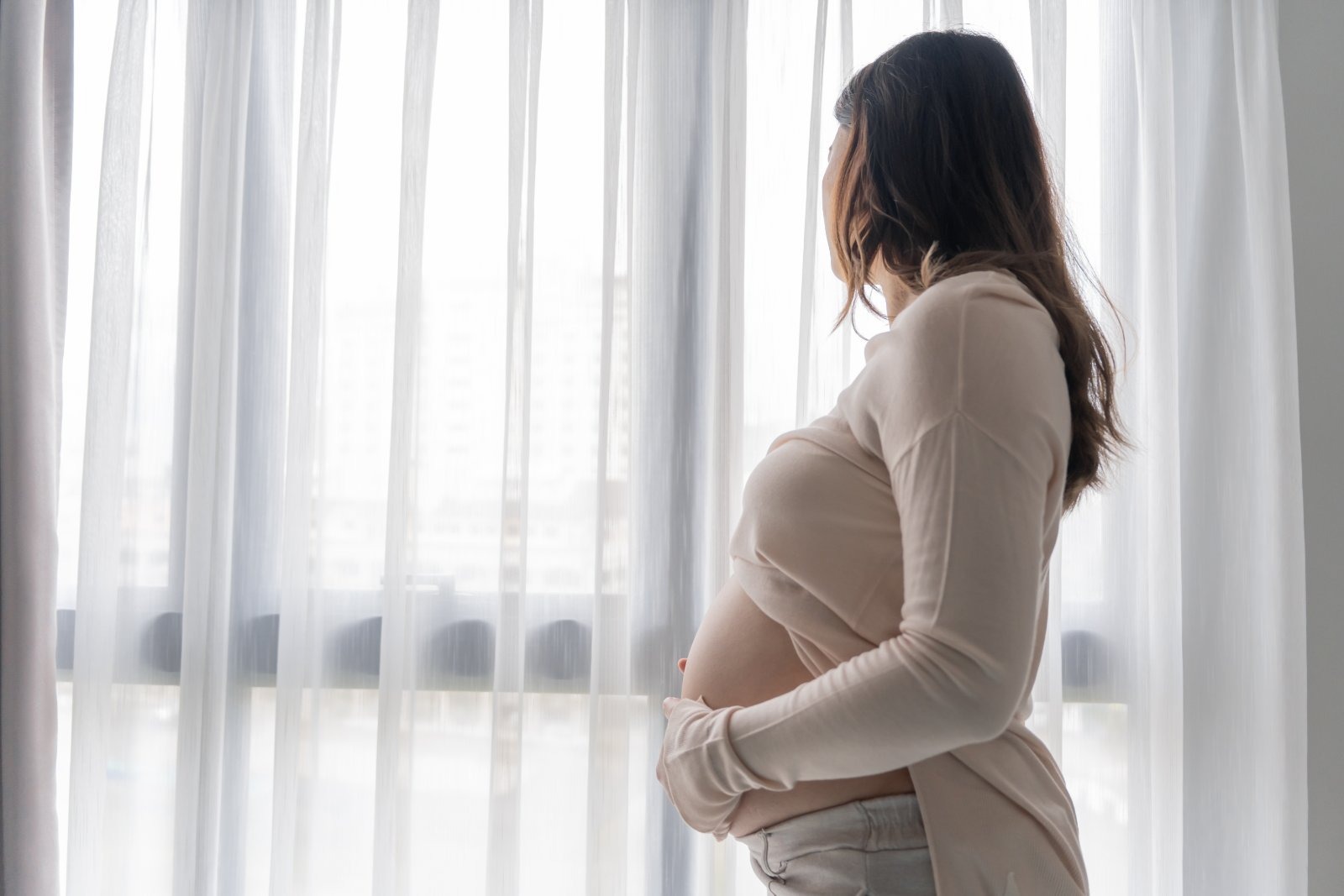 A pregnant woman like those whose babies face a roughly one-in-five chance of developing autism if born with a congenital TORCH infection, which can cross the placenta and harm the developing fetal brain.