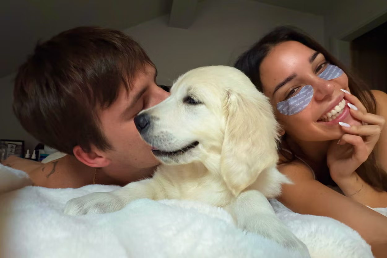 Cruz Beckham and Jackie Apostel with their new puppy Sandy Jean Beckham, whose own Instagram page attracted more than 2,000 followers on its first day.