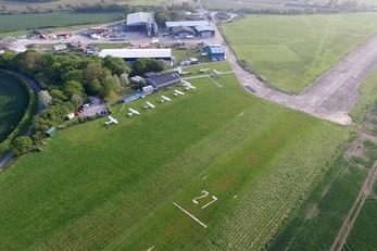 Beccles Aerodrome, where emergency services attended after a light aircraft crashed on approach to landing today, with three people taken to James Paget Hospital in Great Yarmouth with minor injuries.