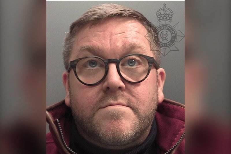 James Chambers, 48, in a Humberside Police custody photograph, taken as he faced charges over a fraud in which one friend of 20 years handed him £125,000 believing it would pay lawyers to unlock an inheritance that…