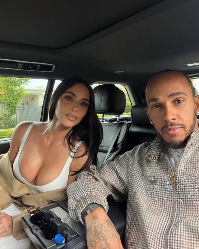 Kim Kardashian and Lewis Hamilton kiss under the Eiffel Tower during Paris romantic getaway
