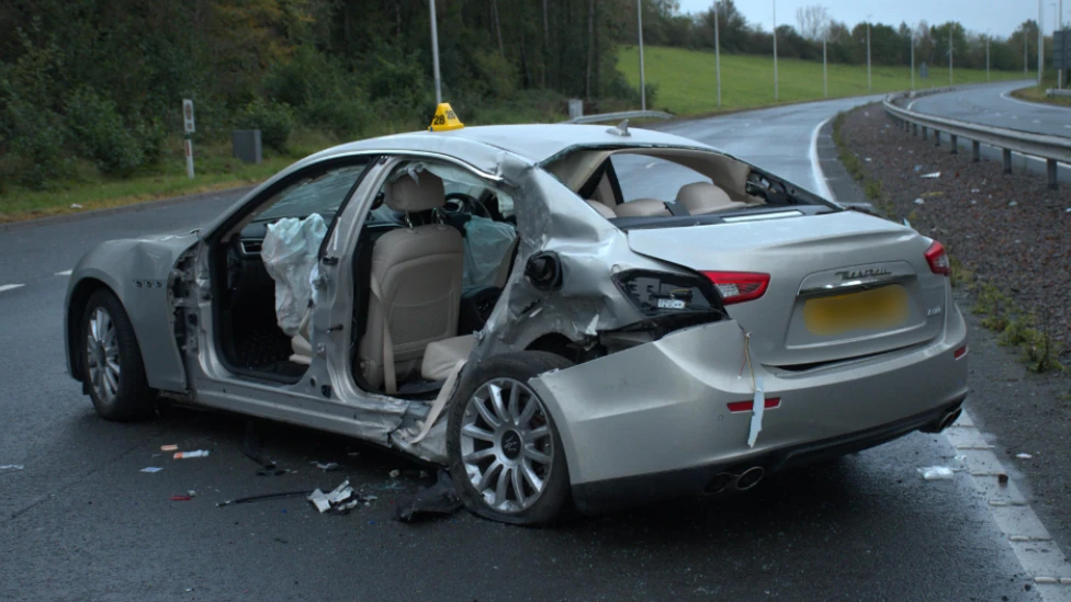 The wrecked Maserati Quattroporte belonging to Ronald Dowling, whose careless driving on the A4042 also left two women from the Caerphilly area seriously injured.