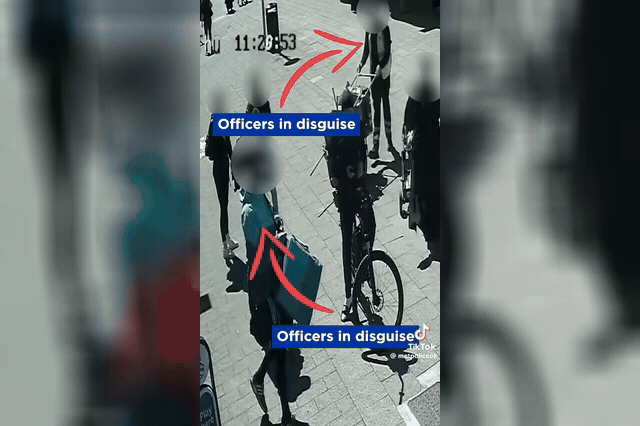 Met Police officers apprehend Roy Hallissey at a Poplar market — a machete was later found concealed in his waistband along with class A drugs.
