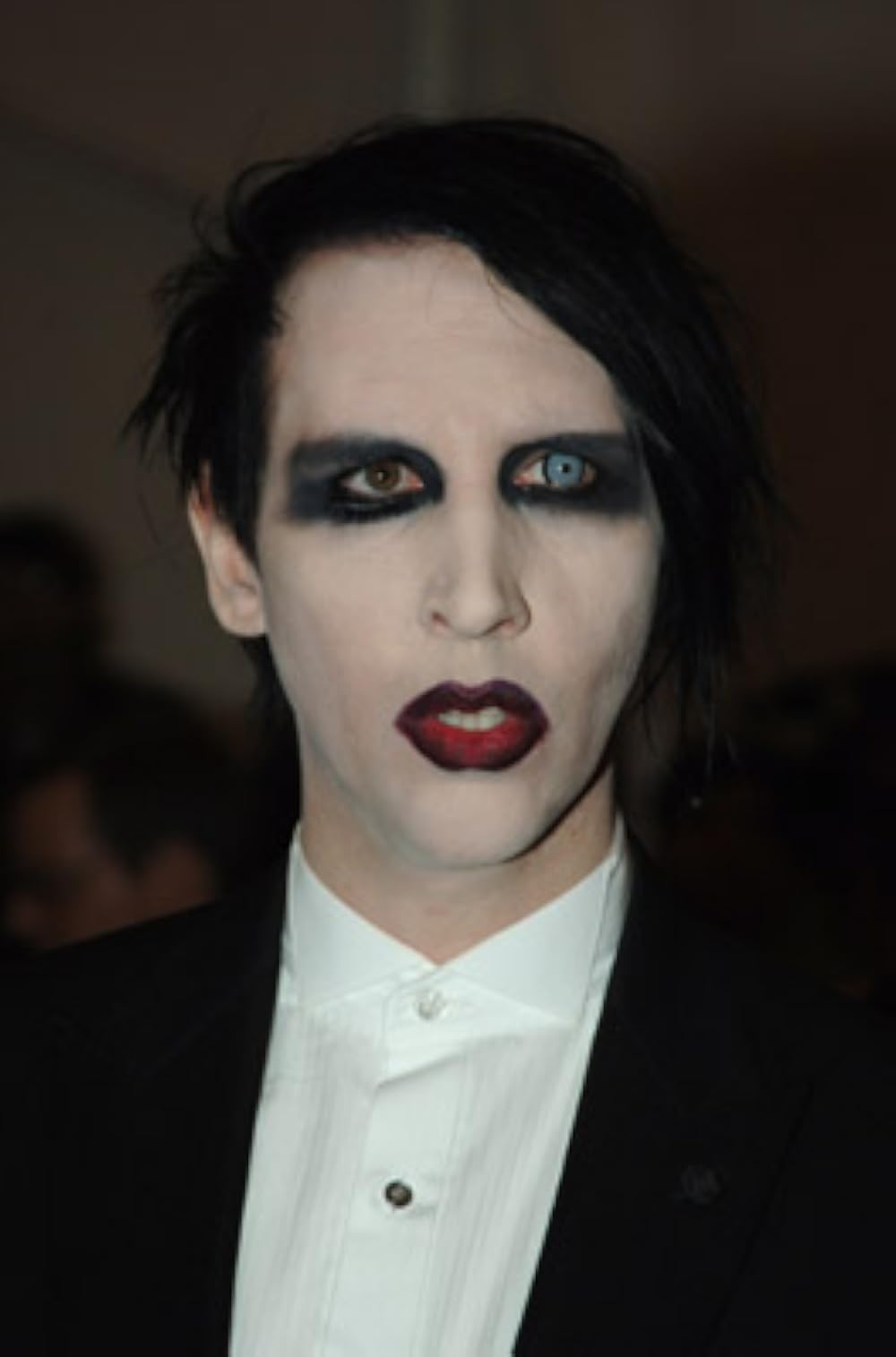Marilyn Manson, whose real name is Brian Warner, faces accusations from multiple women including actress Evan Rachel Wood, who alleged in 2021 he had "horrifically abused" her.