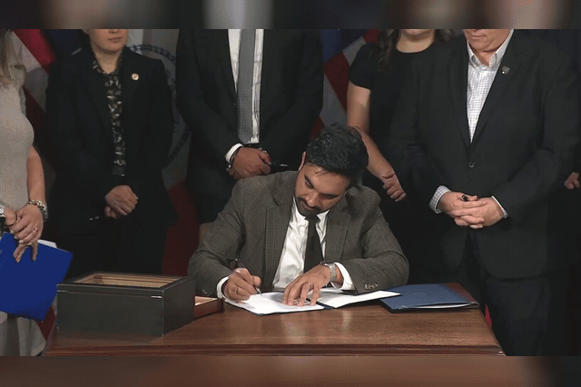 Zohran Mamdani signs executive orders at a ceremony attended by his chief counsel Ramzi Kassem, as Israel's UN ambassador Danny Danon calls for the New York City mayor's arrest over alleged collaboration with America's…