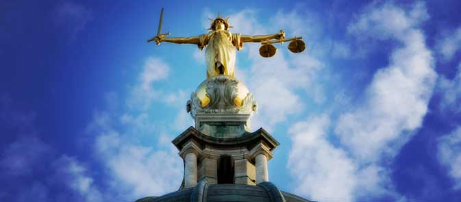 Lejaune Wood, 43, told the Old Bailey he 'yanked' four-month-old LJ from his mother's arms, causing fractures and brain bleeding at their Hayes home in December 2007.