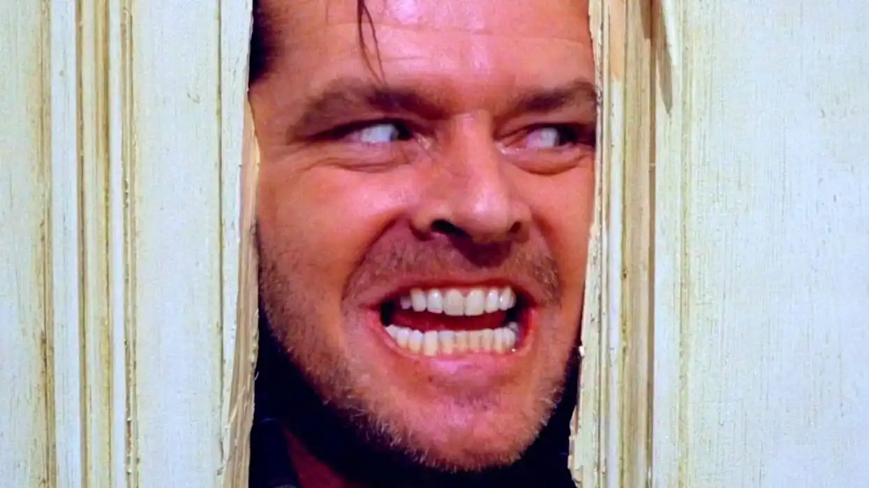 Jack Nicholson as Jack Torrance in *The Shining*, the 1980 horror classic whose original axe prop is estimated to fetch between £30,000 and £50,000 at a Bonhams auction of Stanley Kubrick's personal archive.