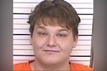 Timothy Reaggle's custody photograph. The 20-year-old now faces additional charges including felony assault and felony escape after attacking two bailiffs following his sentencing.