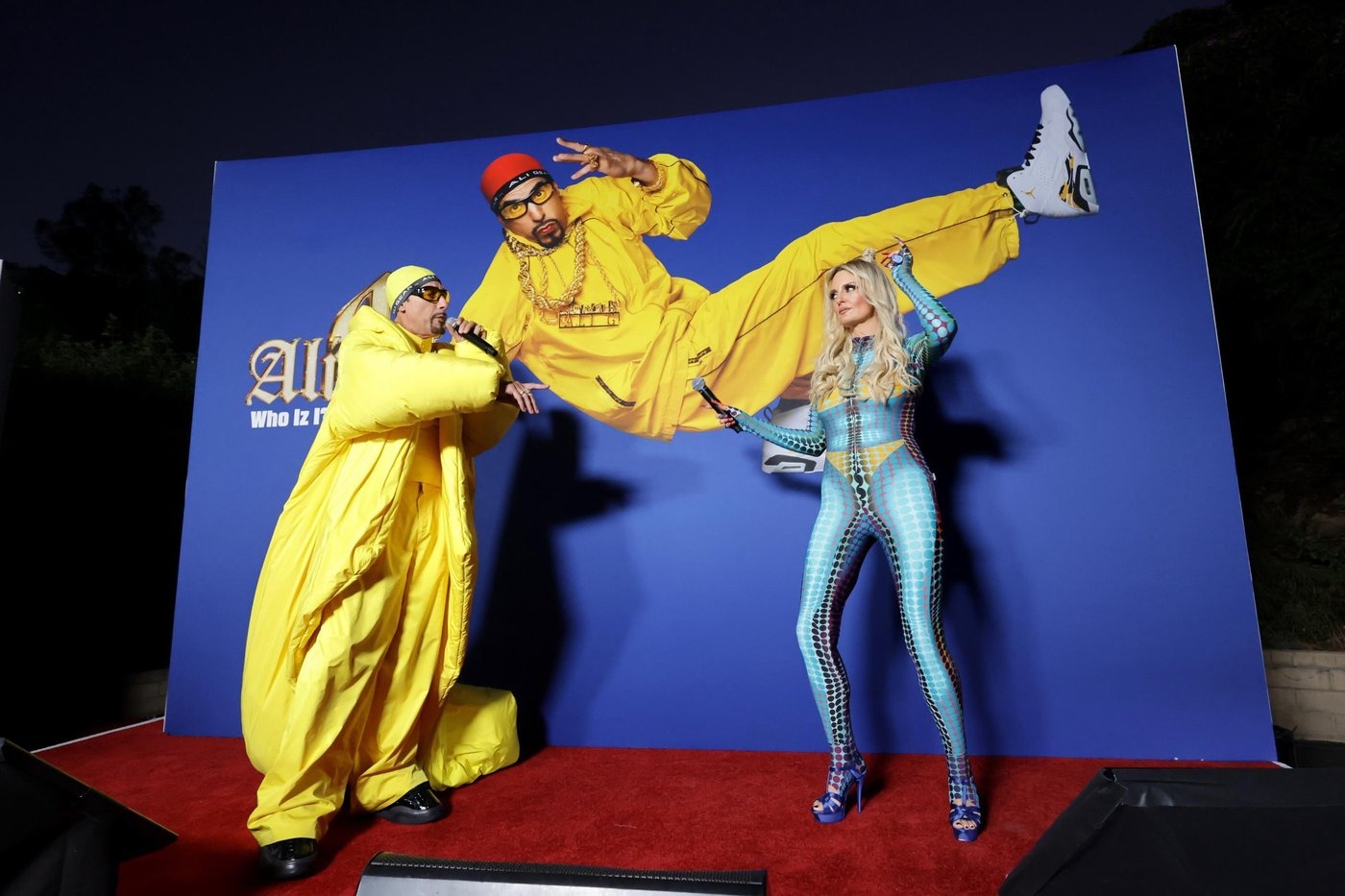 Two costumed attendees at the Ali G 'Who Iz I?' promotional backdrop, as Baron Cohen said he had "forgotten" the names of those who helped make the film.