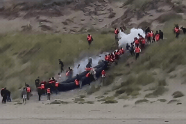 Migrants in life jackets attempt a Channel crossing as France doubles its dedicated riot police on northern beaches to 100 officers under a £662m security deal aimed at blocking such departures.