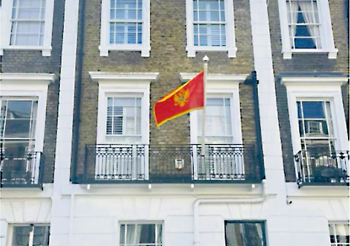The Montenegrin flag flying outside the Cambridge Street embassy that Diana Simpson, 35, says has severely disrupted her sleep and harmed her mental health.