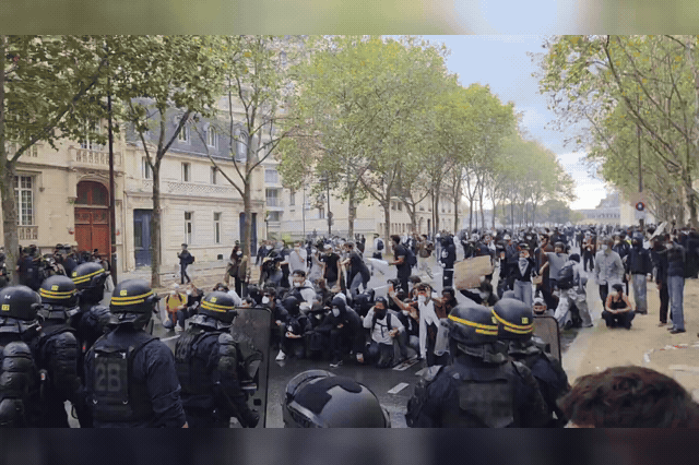 Masked teens hurl petrol bombs at riot police as Europe's student riots spread to cities across Italy