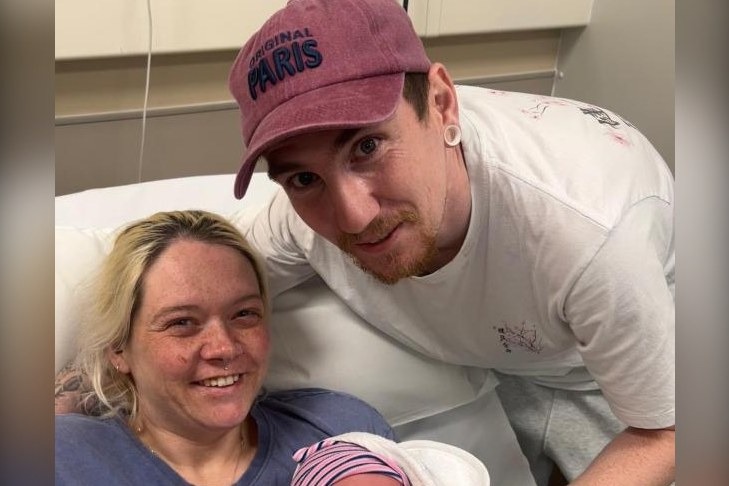 Katie Murphy and Stephen Kirby with baby Cody, who was delivered by Kirby in a KFC car park in Bromsgrove after Murphy realised she wouldn't make it to hospital.