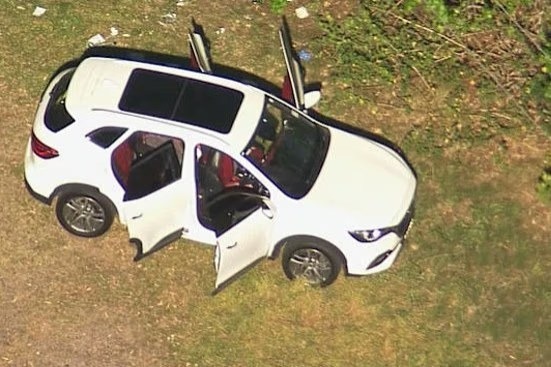 The car on Waratah Road, Valley Heights, where three passers-by performed first aid on the children as the five-year-old boy died at the scene, his two younger siblings left critically ill.