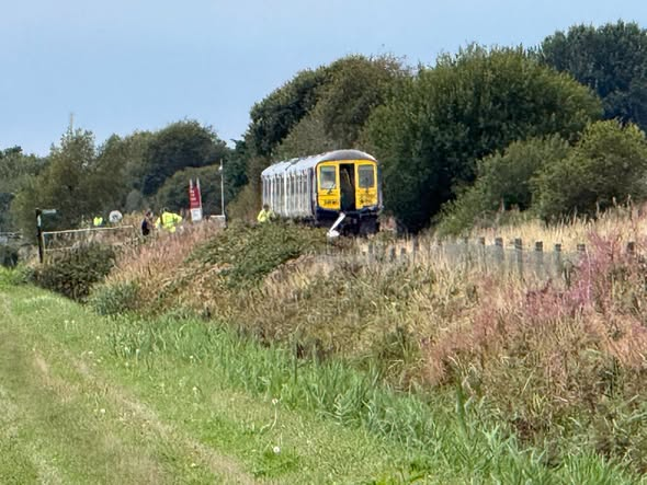 Emergency services declared a major incident following the collision between a train and a vehicle at the Burscough level crossing in West Lancashire.