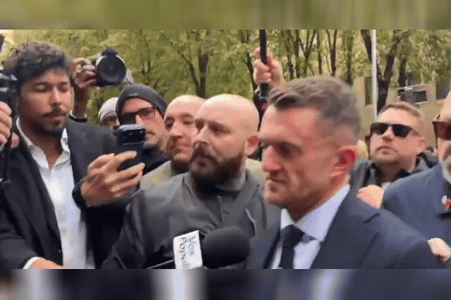 Tommy Robinson leaves court after being convicted of harassing two Daily Mail journalists whose home addresses he exposed to millions of followers, facing up to ten years in prison.