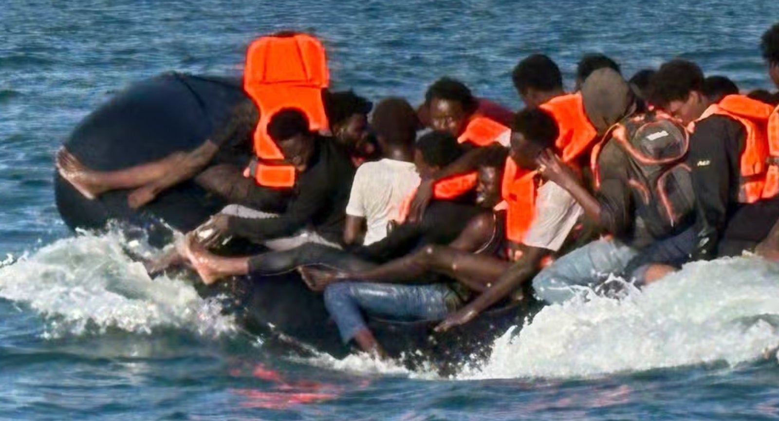 A record 230 migrants were crammed onto a single Channel dinghy in a separate incident, as this year's crossing total stands at 16,391 despite a 43% fall on the same point last year.