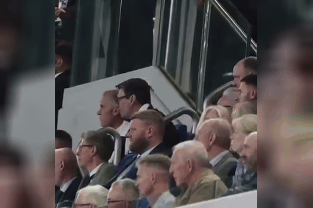 Everton fans celebrate in the stands. Andy Burnham has called the 40-year ban on drinking alcohol in view of the pitch "discrimination" against football supporters.
