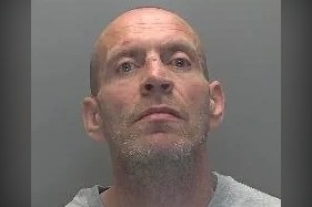 Douglas Witterick, 45, of Godmanchester, was jailed for five years and four months after biting his victim's ear and threatening to stab him during a 3am attack.
